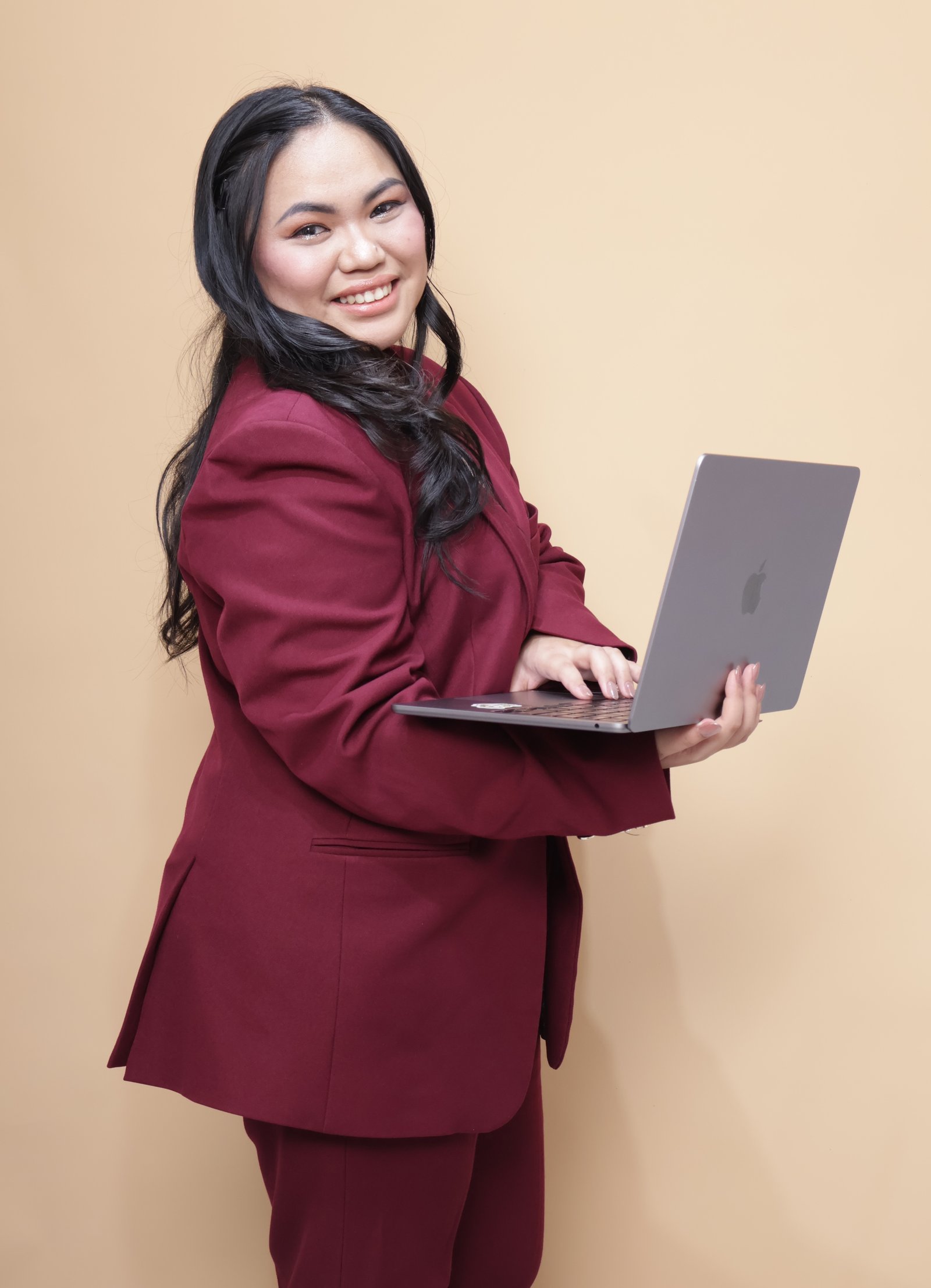 Rio Gonzales working on her laptop